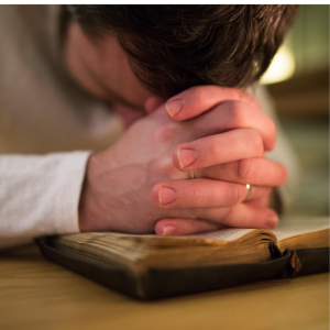 Man praying with Bible- Blog A Better Way to Pray